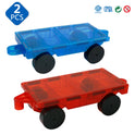 The Magplayer Magnetic Construction Blocks set includes two transparent blue and red toy wagons with four black wheels each, labeled 2 PCS with certification logos. These blocks spark curiosity and promote STEM learning through creative constructions.