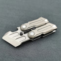 A gray Fidget Magnetic Coin EDC Adult Decompression Toy, shaped like a multifunctional crowbar fidget slider spinner, with geometric design and two pivot screws, rests on a textured gray surface as an anxiety and stress relief gift.