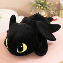The 30cm 40cm black Plush Dragon Toy is a cute stuffed animal and birthday gift for boys and girls. Made with soft PP cotton, this kawaii dinosaur plush features big yellow-green eyes and is perfect as a comfy cushion.