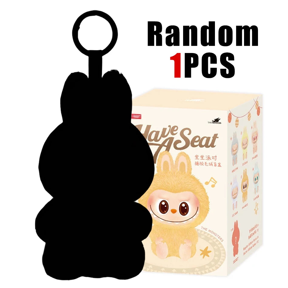 A bunny-shaped keychain appears before a box displaying the Cute Labubu The Monsters Box Toy Sweetheart Vinyl Doll. Random 1pcs with box hints at a surprise model—perfect as a kawaii backpack pendant or plush keychain gift.