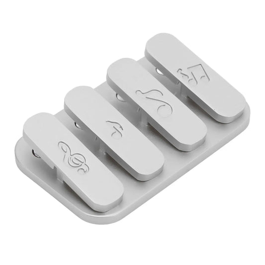 A silver alloy Fidget Clicker with 4 detachable piano key magnetic sliders. This metal fidget toy is ideal for ages 6-12, helping keep hands busy and organized while providing tactile fun—no cables or chemicals involved.