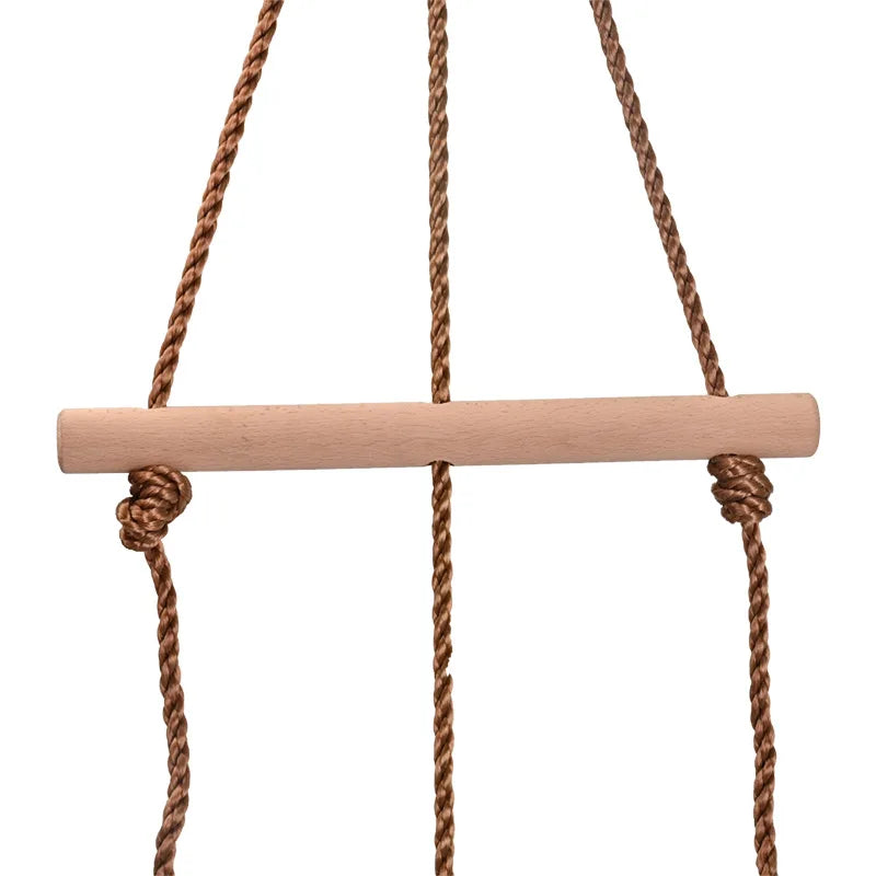 A close-up of the Disc Swing Gym Monkey Bars Tree Swing Set, featuring a wooden seat with brown knotted ropes, hanging vertically against a white background.