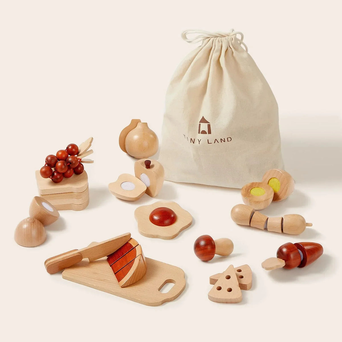 Wooden Cut & Play Food Set with Knife and Board including a cutting board, toy knife, assorted fruits and vegetables, and a storage bag.