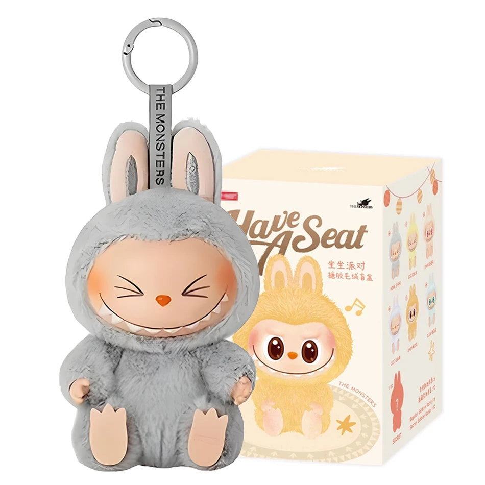 The Cute Labubu The Monsters Box Toy Sweetheart Vinyl Doll, Style G with box, is a kawaii backpack pendant and plush keychain in a fuzzy bunny costume—perfect for decoration or gifting to any MINISO fan.