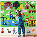 A young child in blue overalls engages with the Farm Animals Felt Story Board Set Interactive Play Kit for Toddlers in color D, featuring a vibrant farm scene with animals, barn, windmill, pond, farmer, tractor, and My Farm sign for early learning fun.