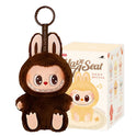 The Cute Labubu The Monsters Box Toy Sweetheart Vinyl Doll in Style D with box is a plush keychain featuring large eyes, red cheeks, and bunny ears—perfect as a kawaii backpack pendant or for PVC figure collectors.