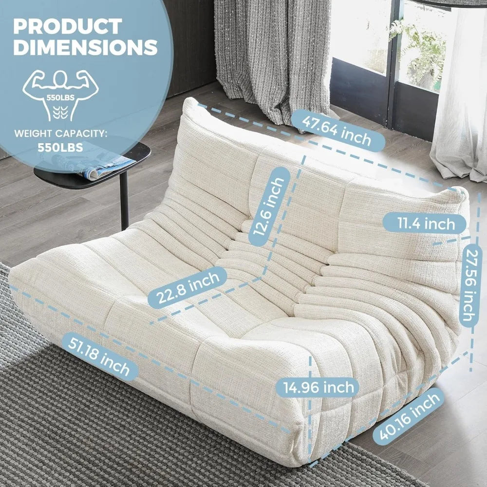 The Fireside Loveseat Sofa Couch Modern Chenille Bean Bag Chair in cream chenille is shown on wood floors with a rug. Blue lines mark its dimensions, and a graphic indicates a 550-lb weight capacity.