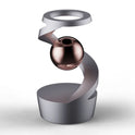 The Kinetic Alloy Fidget Spinner is a sleek, modern stress relief toy in grey, featuring a spiral structure that encircles a metallic sphere. It stands on a round base, making it both a desktop accessory and art piece with an innovative design reminiscent of gravity-defying art.