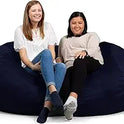 Two women smiling and sitting comfortably on a Fuf XXL Foam Filled Bean Bag Chair, Navy, 6 Feet, with a removable cover, against a white background.