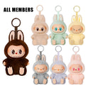 Seven Cute Labubu The Monsters Box Toy plush keychains in animal costumes, with big eyes and bunny ears, are displayed—six in two rows and a larger dark brown one on the left. Text: “ALL MEMBERS.” Suitable as backpack pendant or decoration gifts.