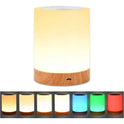 The Portable Touch-Sensitive LED Night Light features a wooden base and displays colors like orange, warm yellow, and cyan in preview images. This rechargeable lamp includes a USB port at the bottom for convenience.