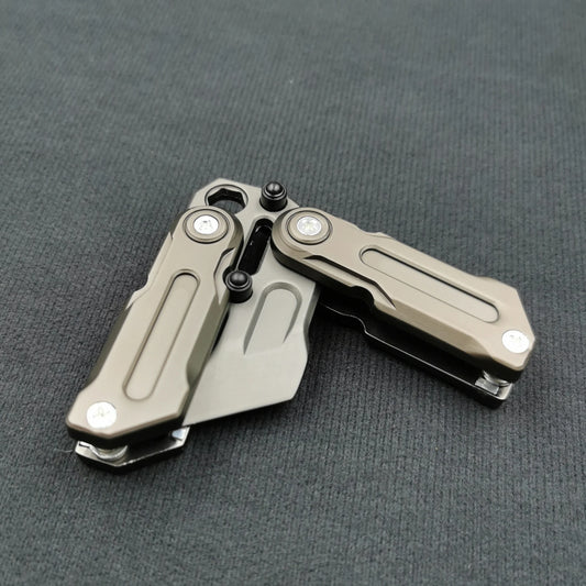 The Fidget Magnetic Coin EDC Adult Decompression Toy, a multifunctional crowbar fidget slider spinner with two metallic handles and visible screws, is partially opened and placed on a dark textured surface.