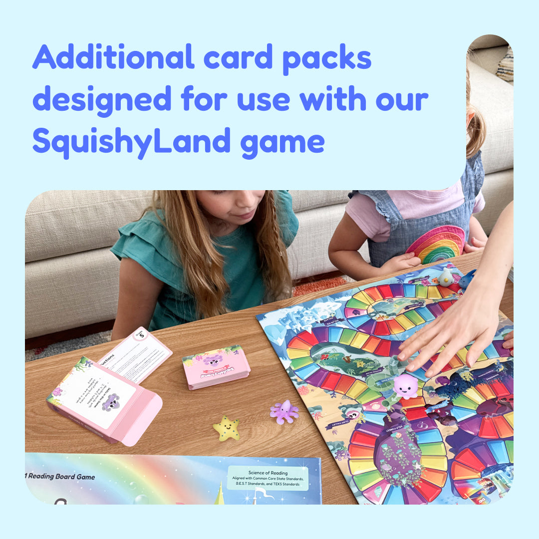 Two children play a Squishyland Grades 3–5 Expansion Card Packs board game with colorful paths and animal figures, learning multisyllabic word reading by using cards with derivational suffixes laid out on the table.
