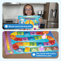 A girl holds a Squishy Time Rescue Telling Time Game box, with a close-up below showing a game board featuring a path of colored gems and small rubber sea creatures used to help children practice telling time.
