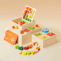Tiny Land® Montessori Toys for Toddlers (18–24 Months) features colorful sorting boards, shape puzzles, stacking pieces, and a beaded lacing string, all arranged on light wooden boxes against a beige background.