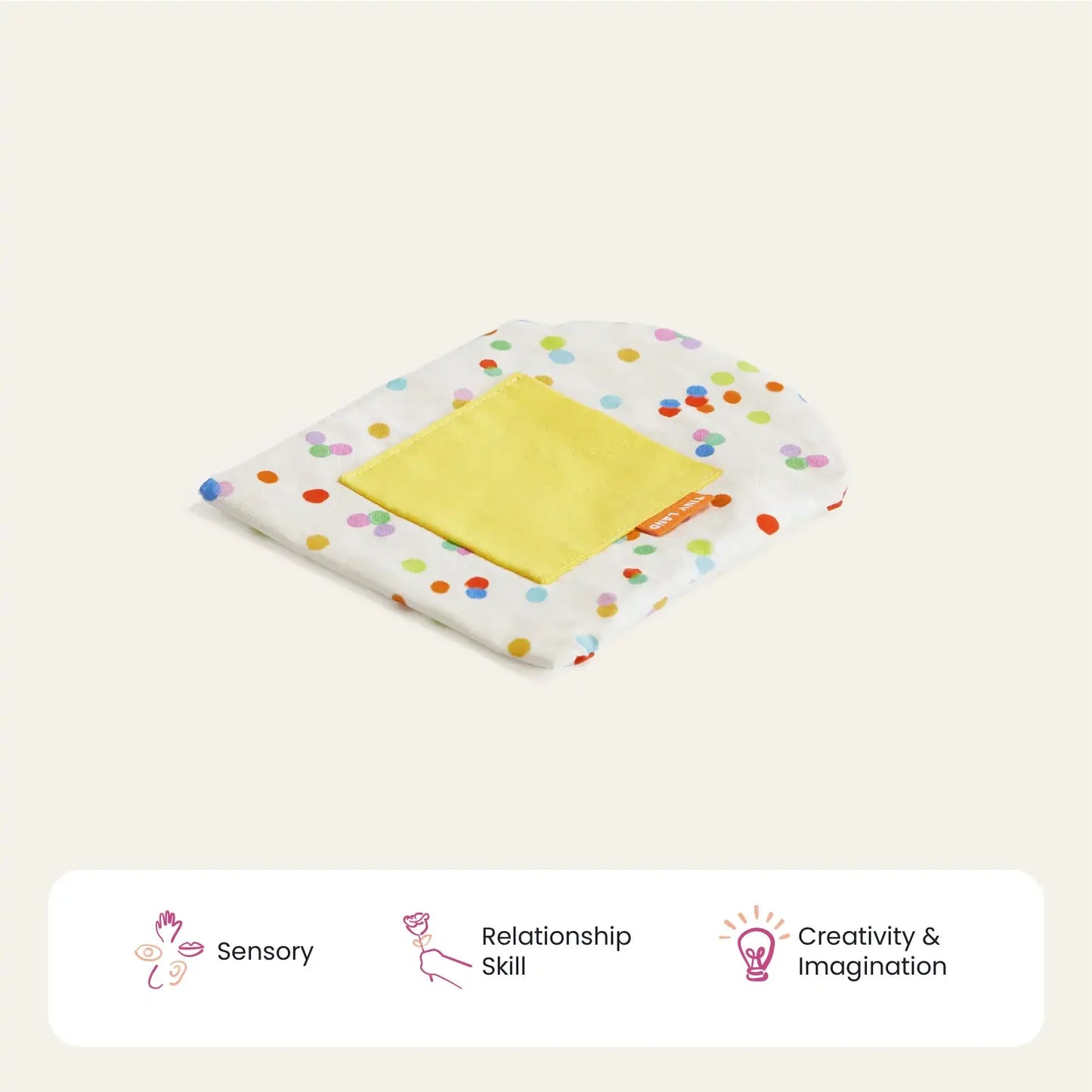 A colorful polka-dotted sensory cloth from Tiny Land® Montessori Toys for Infants (10–12 Months), featuring a yellow square patch, is displayed on a neutral background with icons for sensory development, creativity, and relationship skills.