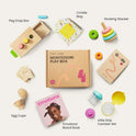 Flat lay of Tiny Land® Montessori Toys for Infants (10–12 Months): Peg Drop Box, Crinkle Bag, Rocking Stacker, Egg Cups, Emotions Board Book, Little Grip Canister Set, with Montessori playset and guide in the center.