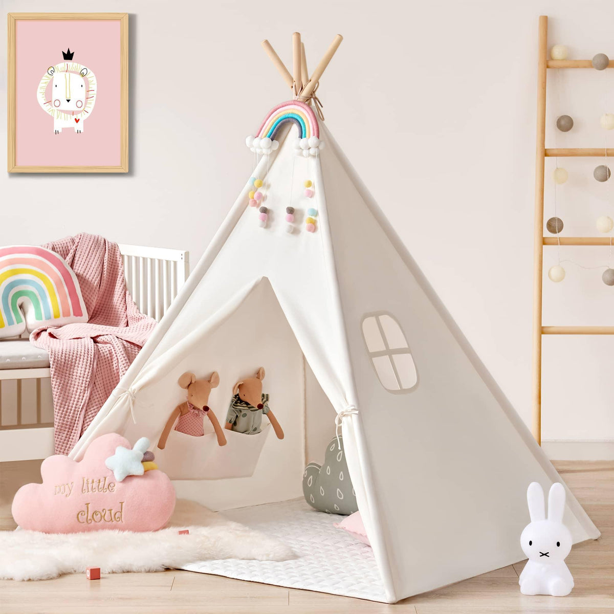 A white fabric Cozy Kids Teepee Tent with Padded Mat featuring a rainbow decoration, a padded floor mat, and two stuffed animal toys inside.