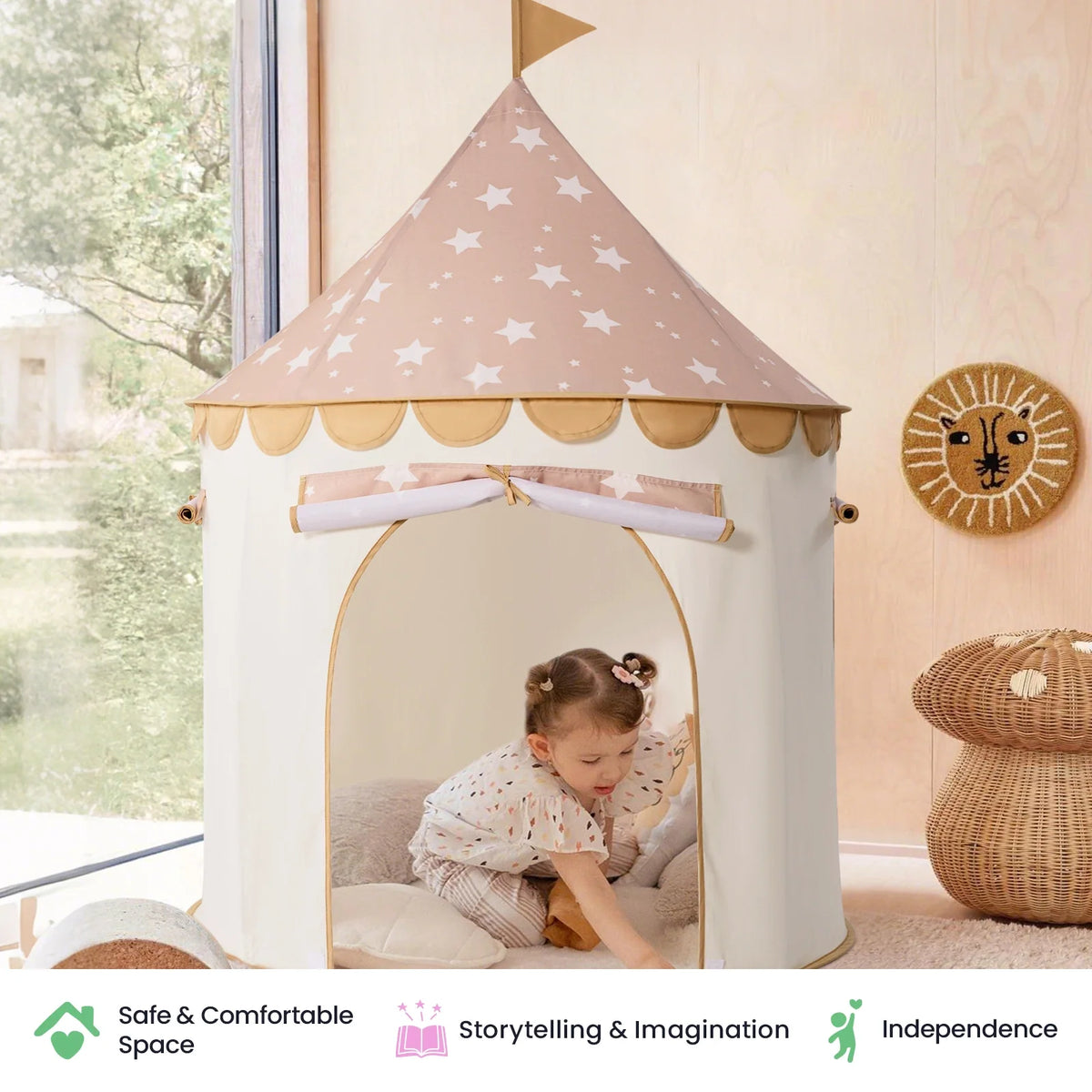 A toddler plays inside a cone-shaped Starry Indoor Play Tent for Toddlers decorated with a white star pattern.