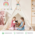 Two girls sit in front of a white Cozy Kids Teepee Tent with Padded Mat, with one girl using a toy stethoscope to examine a small dog.