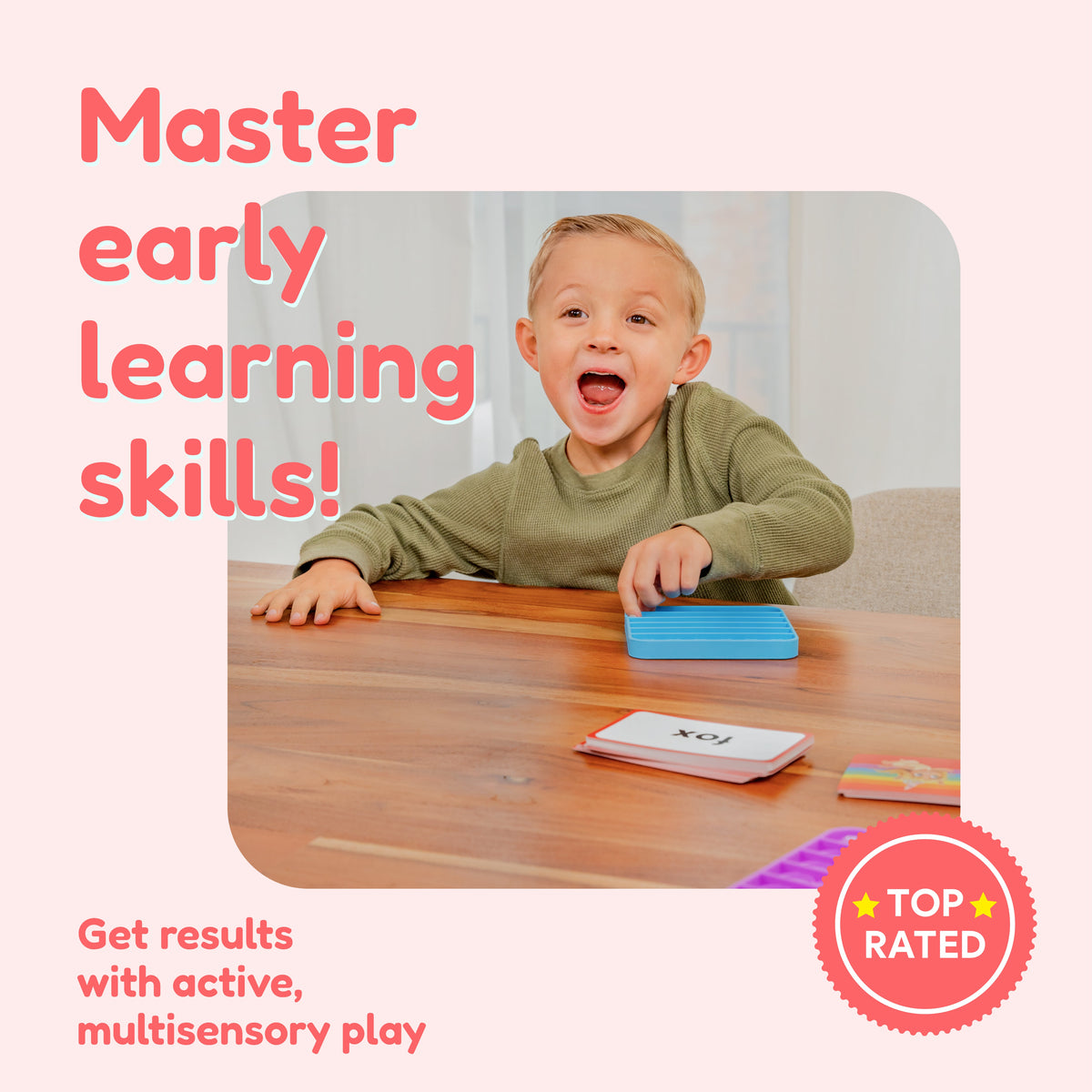 A young child smiles while using a blue silicone sensory tray and flashcards from the Kindergarten Classroom Bundle to practice literacy skills, with text reading Master early learning skills! and a Top Rated seal.