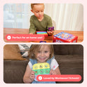 A child uses cards for game-based learning at a table with the Pre-K Classroom Bundle, while a girl holds a fidget toy with circular icons to support foundational literacy.