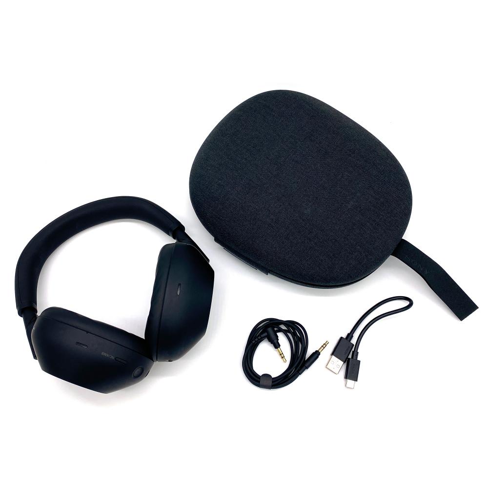 Sony WH-1000XM6 Noise-Cancelling Headphones (Refurbished) shown with a protective carrying case, a 3.5mm audio cable, and a USB-C charging cable.