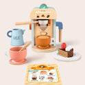 Wooden Play Coffee Maker Set featuring an espresso machine with a portafilter, a milk pitcher, two cups, a slice of toy cake on a plate, and a menu card.