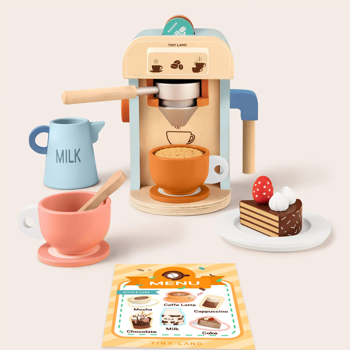 Wooden Play Coffee Maker Set featuring an espresso machine with a portafilter, a milk pitcher, two cups, a slice of toy cake on a plate, and a menu card.
