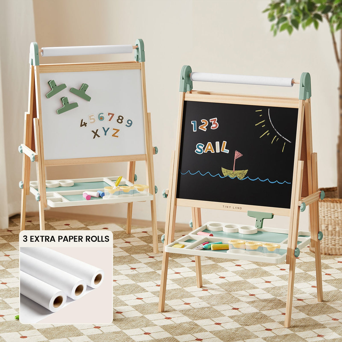 Two green Magnitales Double-Sided Art Easel with Paper Roll units featuring magnetic whiteboards and chalkboards, with an inset showing three extra paper rolls.
