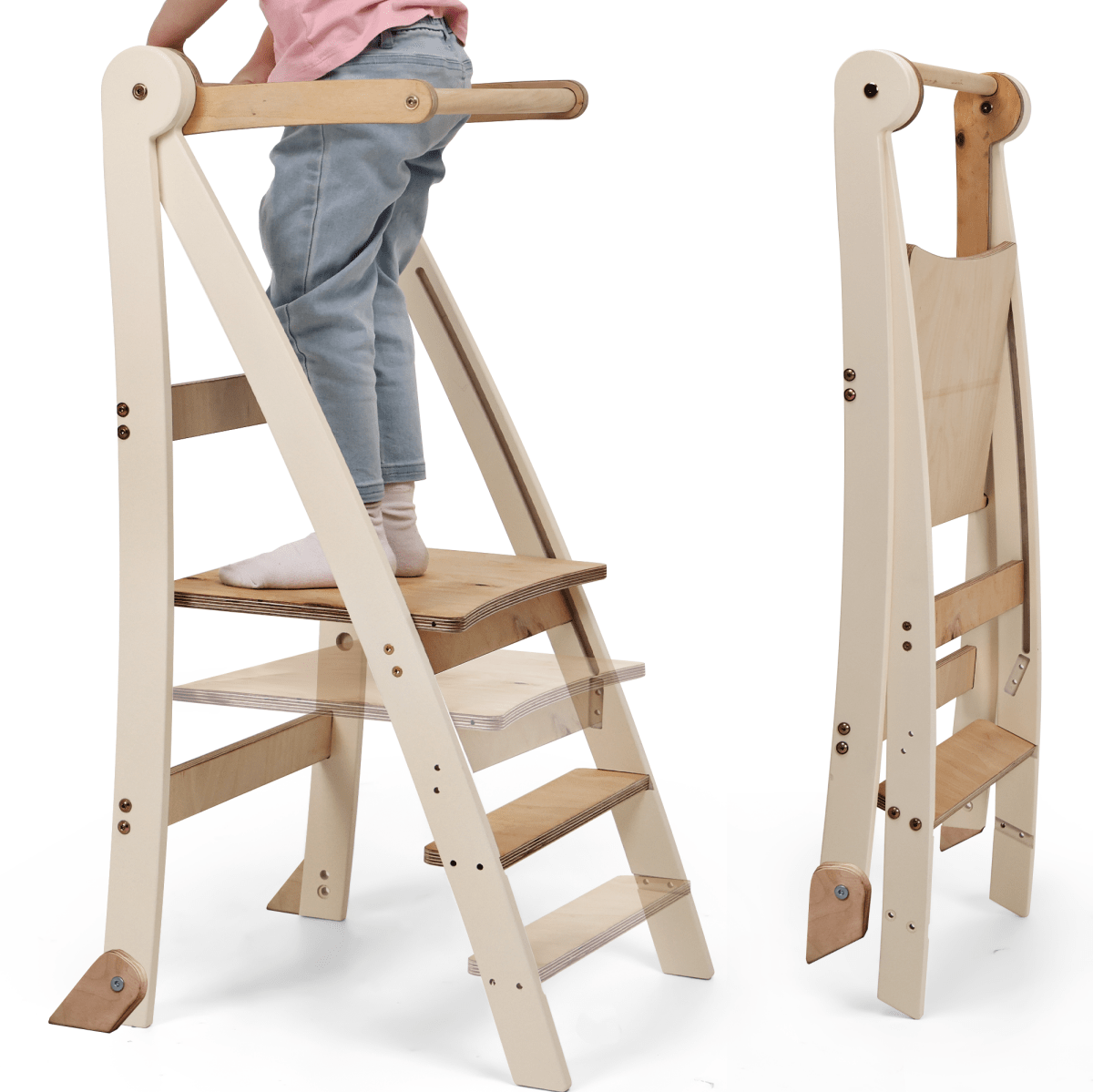 A child stands on the Adjustable Montessori Tower - Kids Step Stool, a natural wood high chair featuring steps and a safety bar, while a folded version of the tower is displayed beside it.