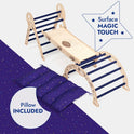 The Apollo 4in1 Climbing Set: Pikler Triangle, Arch, Slide Board, and Cushion for Little Toddlers Astronauts (1–3 Years) is displayed on a star-patterned mat. This Montessori-inspired climbing set features wooden climbing toys with navy bars and a slide, plus two matching navy cushions. Text highlights include “Surface MAGIC TOUCH” and “Pillow INCLUDED,” making it a perfect choice for toddler climbing toy enthusiasts.