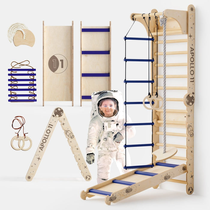 The Apollo Swedish Wall Climbing Set — Moon Swing & Slide is a children’s indoor sensory gym inspired by Apollo 11, featuring a Swedish wall ladder, wooden frames, rings, rope ladder, and an astronaut centerpiece on a white background.