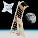 The Apollo Swedish Wall Climbing Ladder for Little Astronauts, with Moon Swing Set and Slide Board, stands before a starry space backdrop. APOLLO 11 limited edition shines on a star—NASA approved—for the ultimate space-themed kids playset.