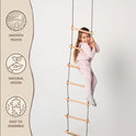 A young girl in light pajamas climbs the Climbing Rope Ladder for kids 3-9 y.o., an activity that supports child development and muscle strengthening. Beside her, icons highlight features: smooth touch, natural wood, easy to assemble. The background is plain white.