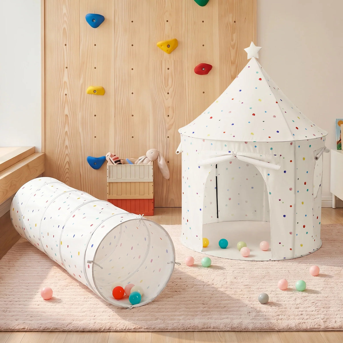 Starry Indoor Play Tent for Toddlers featuring a conical playhouse and matching tunnel with multicolored polka dots, surrounded by scattered plastic balls.