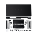 The Hexcal Elevate Standing Desk kit is displayed on a white background, featuring a large tabletop, metal frame parts, control box, cables, power adapters, mounting hardware, and screws.