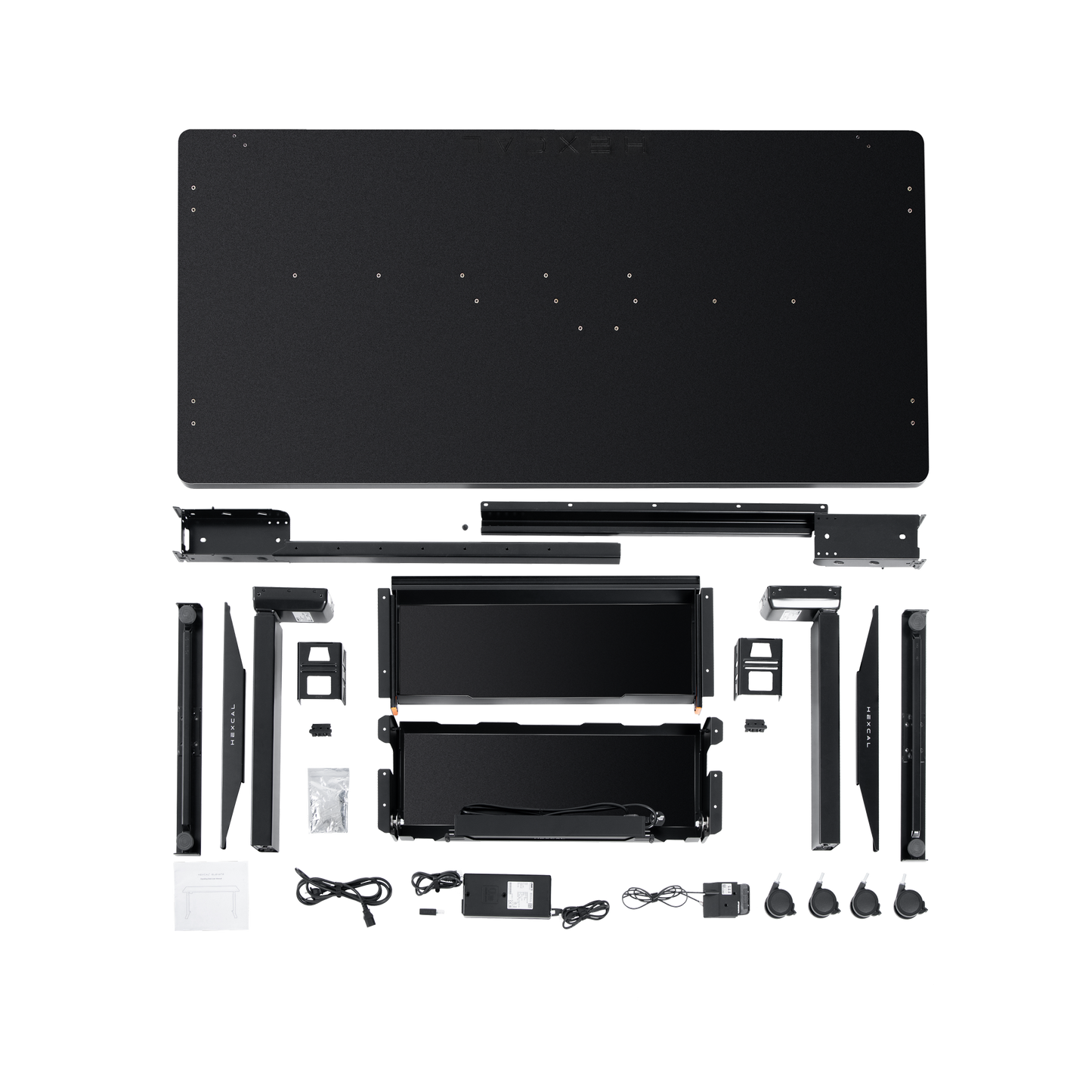 The Hexcal Elevate Standing Desk kit is displayed on a white background, featuring a large tabletop, metal frame parts, control box, cables, power adapters, mounting hardware, and screws.