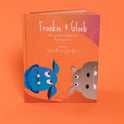The Frankie & Gloob – Picture Book features illustrations of a blue creature and a grey hippo on the cover that introduce concepts of social-emotional learning.