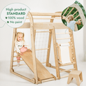 A young girl plays on the Indoor Playground for Children - 7in1 Playground + Swings Set + Slide Board + Art Set, featuring a slide, rope net, ladder, and drawing paper roll. A bubble reads: High product STANDARD 100% wood No paint. Inset shows a child climbing.