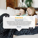 A smiling boy and girl sit on a couch, covered with the Knit Weighted Blanket. A glowing customer review with a 5-star rating and the name Mary R. is shown.