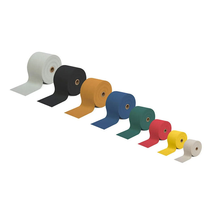 A diagonal row of eight THERABAND Professional Latex Resistance Bands in varying colors, ranging from beige to black.
