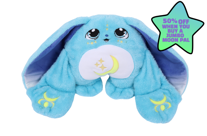 A blue Bo Jr. Moon Pal – 2.5 lb Kids Weighted Plush with long ears, large eyes, and a crescent moon and stars on its belly, next to a star-shaped sign advertising 50% off a jumbo moon pal.