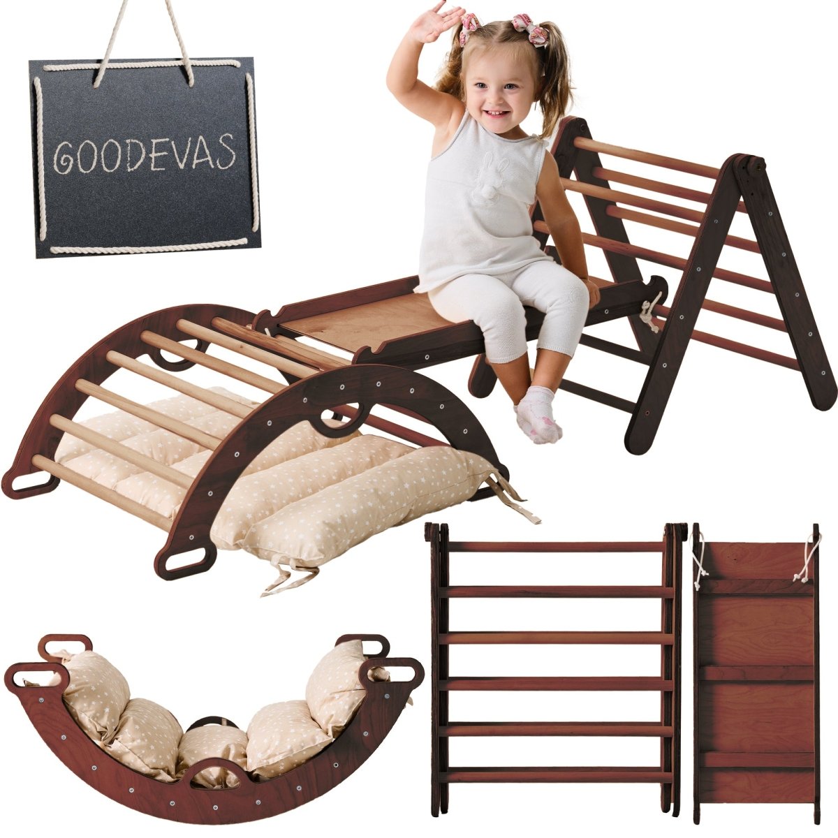 A smiling young girl plays on the Pikler Triangle Set for Toddlers in Chocolate, featuring a triangle ladder, climbing arch, slide board, and cushion. Extra images show various setups. A chalkboard-style sign reads GOODEVAS.