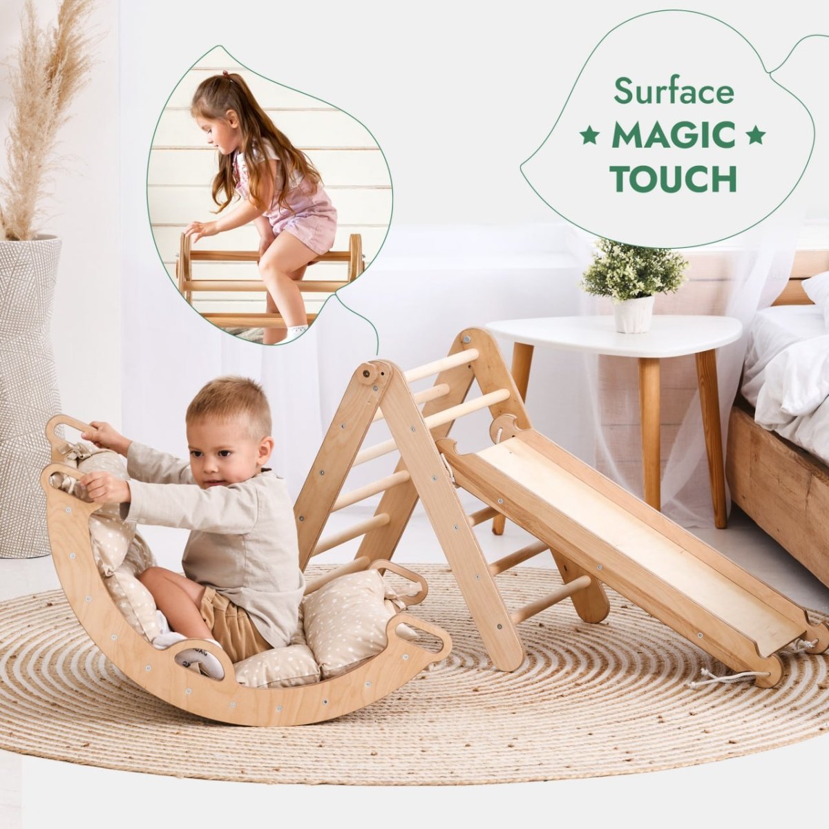 A young girl climbs the Pikler Triangle Set for Toddlers, featuring a triangle ladder, climbing arch, slide board, and cushion, while a toddler sits on the cushioned rocker. Text reads: Surface MAGIC TOUCH.
