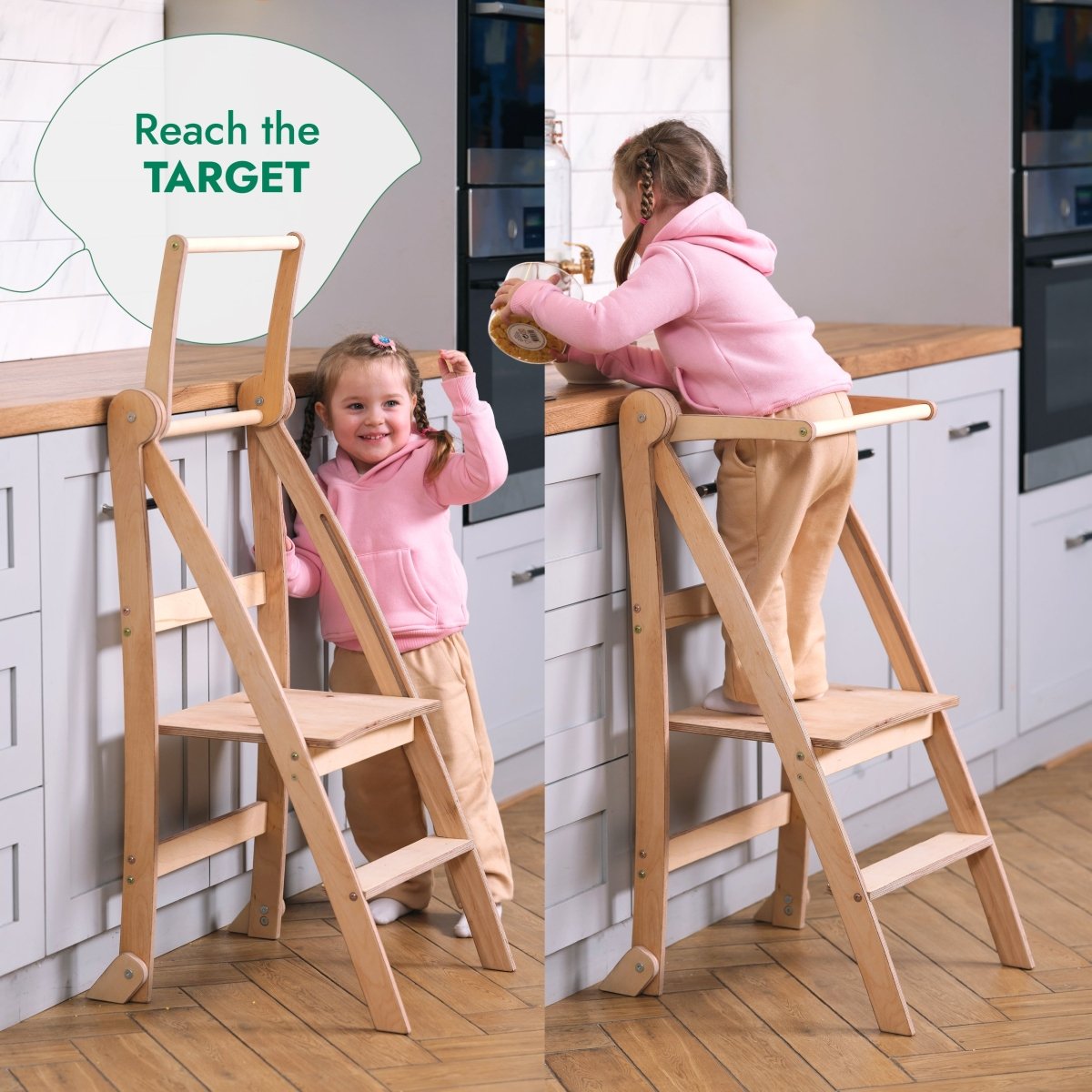 A young girl in a pink hoodie uses the Toddler Tower: Foldable Step Stool for Toddlers - Gray to reach the kitchen counter. A speech bubble says, Reach the TARGET.