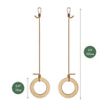 The Wooden gymnastic rings for kids set includes two wooden rings, each suspended from a 4 ft (125 cm) brown rope with a metal clip at the top. The rings measure 5.9 in (15 cm) in diameter, making them ideal for encouraging children’s fitness and supporting their physical development.