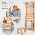 The Wooden Swedish Wall / Climbing Ladder Set for children includes a swing, slide board, and art add-on with a paper roll. Two kids draw at the art table while another stands by the climbing structure; a wooden stool is beside the set.