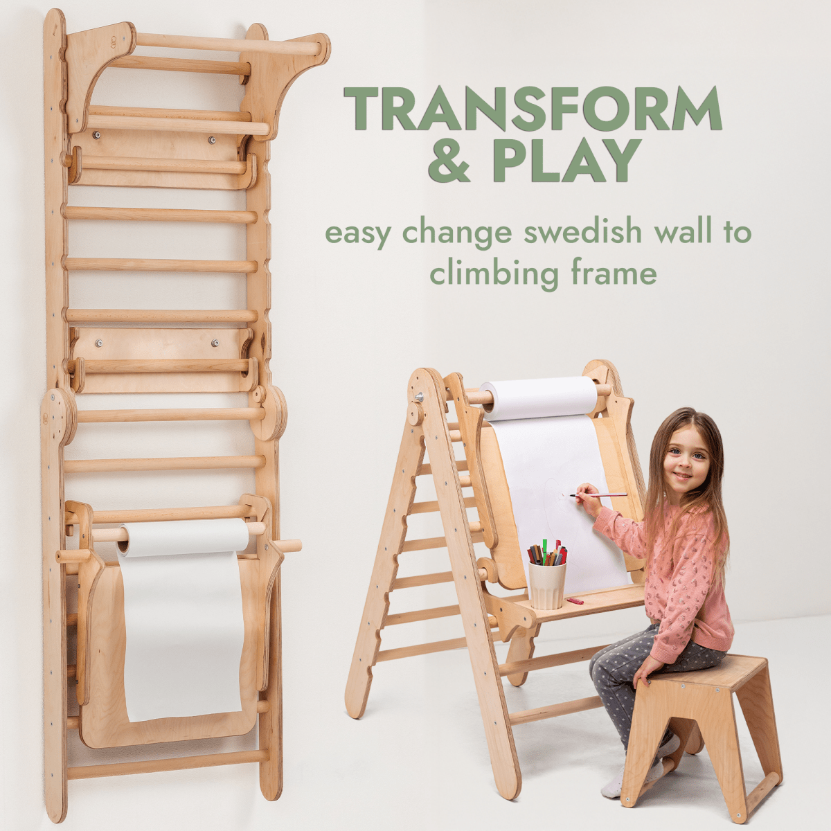 The Wooden Swedish Wall / Climbing ladder for Children + Swing Set + Slide Board + Art Add-on transforms from a climbing structure to an art station. A girl draws on paper with supplies on the frame. Text: Transform & Play—easy change from wall to climber!.